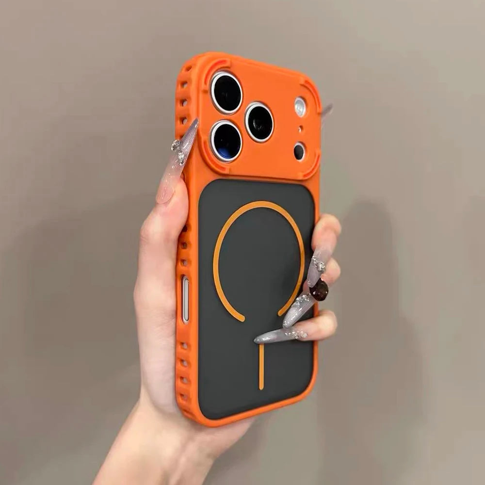 An orange frosted magnetic silicone case for an iPhone is held in a hand against a neutral background.