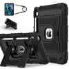A black protective case for an Apple iPad is shown with a stylus and a separate accessory.