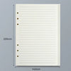 Un cuaderno de hojas sueltas blanco con líneas rayadas mostrado contra un fondo gris.