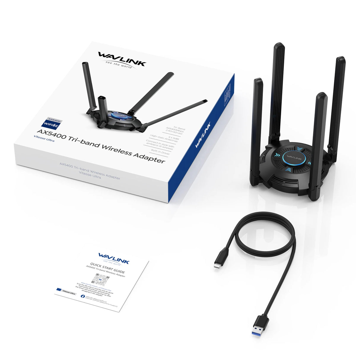 A white box and black WiLink AX5400 Tri-band Wireless Adapter with an attached cable are shown.