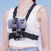 A person wearing a black adjustable head and chest mount for an action camera or phone.