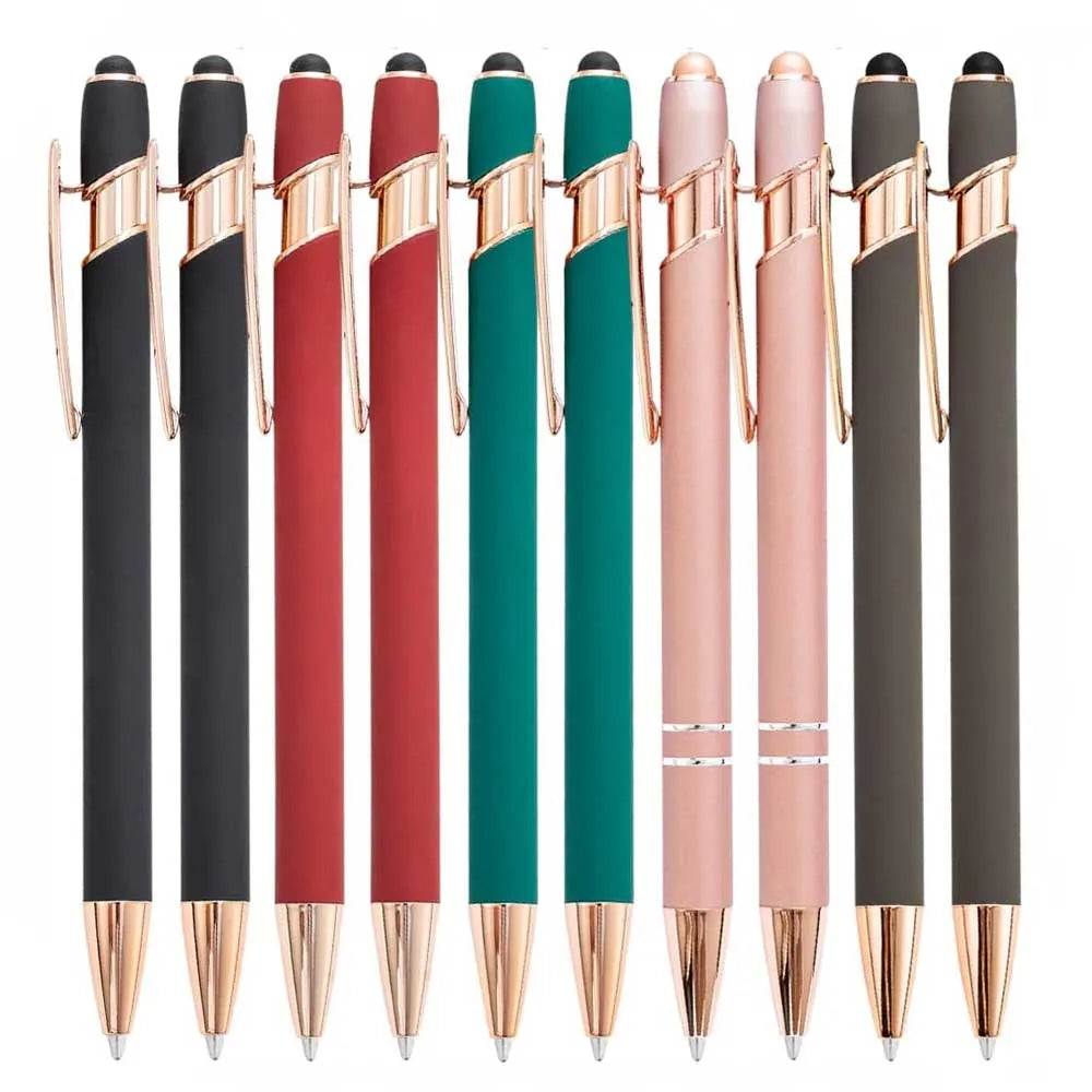 A row of black, pink, and teal retractable styluses and ballpoint pens displayed vertically.