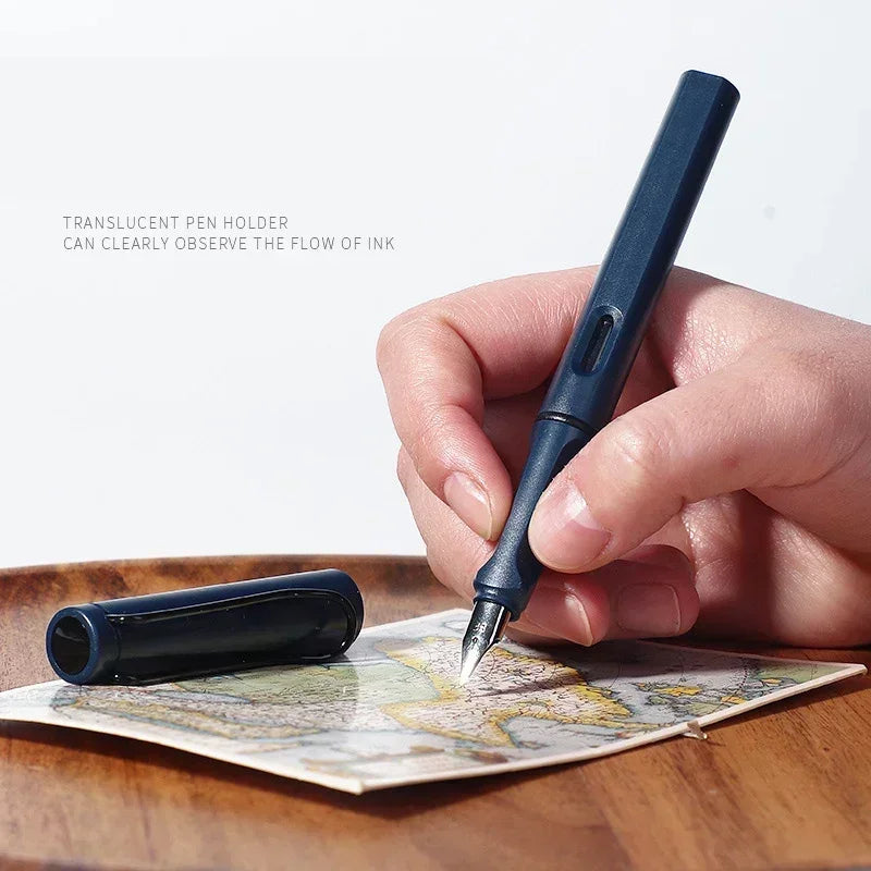 A hand holds a dark blue translucent pen holder with a fountain pen, demonstrating its ability to clearly observe the flow of