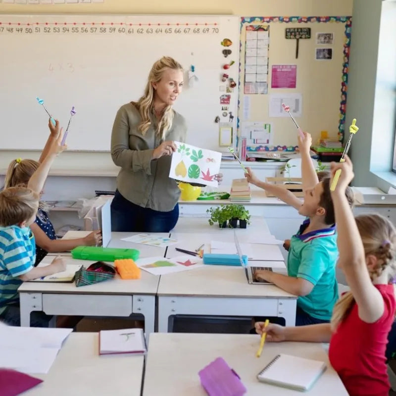 A group of elementary school students are using a stainless steel telescopic teaching pointer in a classroom setting.