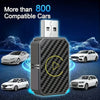 A black electronic adapter with a white box, surrounded by several white cars, demonstrating compatibility for over 800 vehic