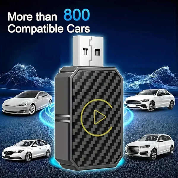 A black electronic adapter with a white box, surrounded by several white cars, demonstrating compatibility for over 800 vehic