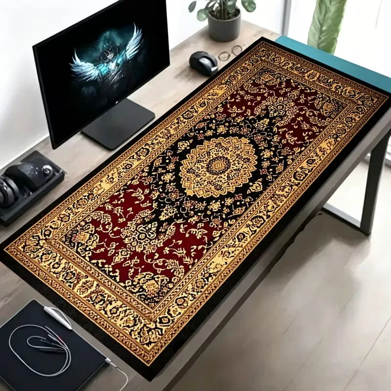 A vintage Persian rug design mouse pad with a black and gold pattern displayed on a wooden desk.