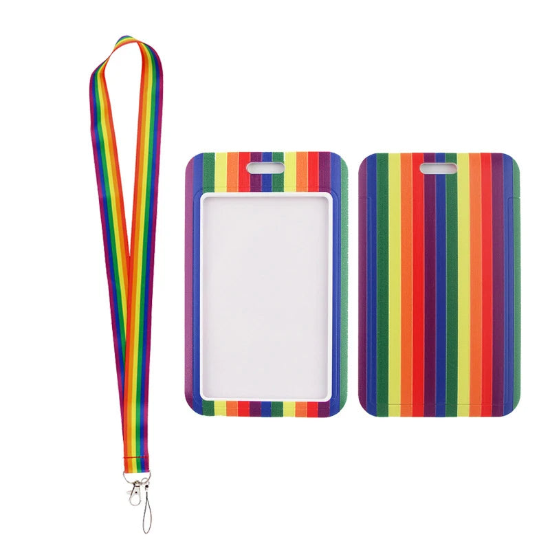 A colorful striped lanyard with a rectangular clip for holding ID badges and accessories.