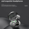 A close-up view of a pair of silver wireless earbuds resting on a dark gray surface.