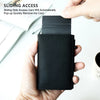 A hand holds a black slim leather wallet with a card pop-up feature.
