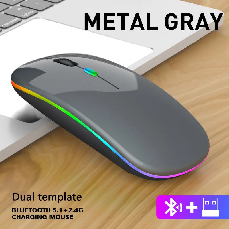 Edelstahlgraue ergonomische kabellose Gaming-Maus mit RGB-Hintergrundbeleuchtung auf Holzoberfläche.