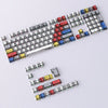 A full set of translucent PBT keycaps with side-printed legends in a cherry profile layout.