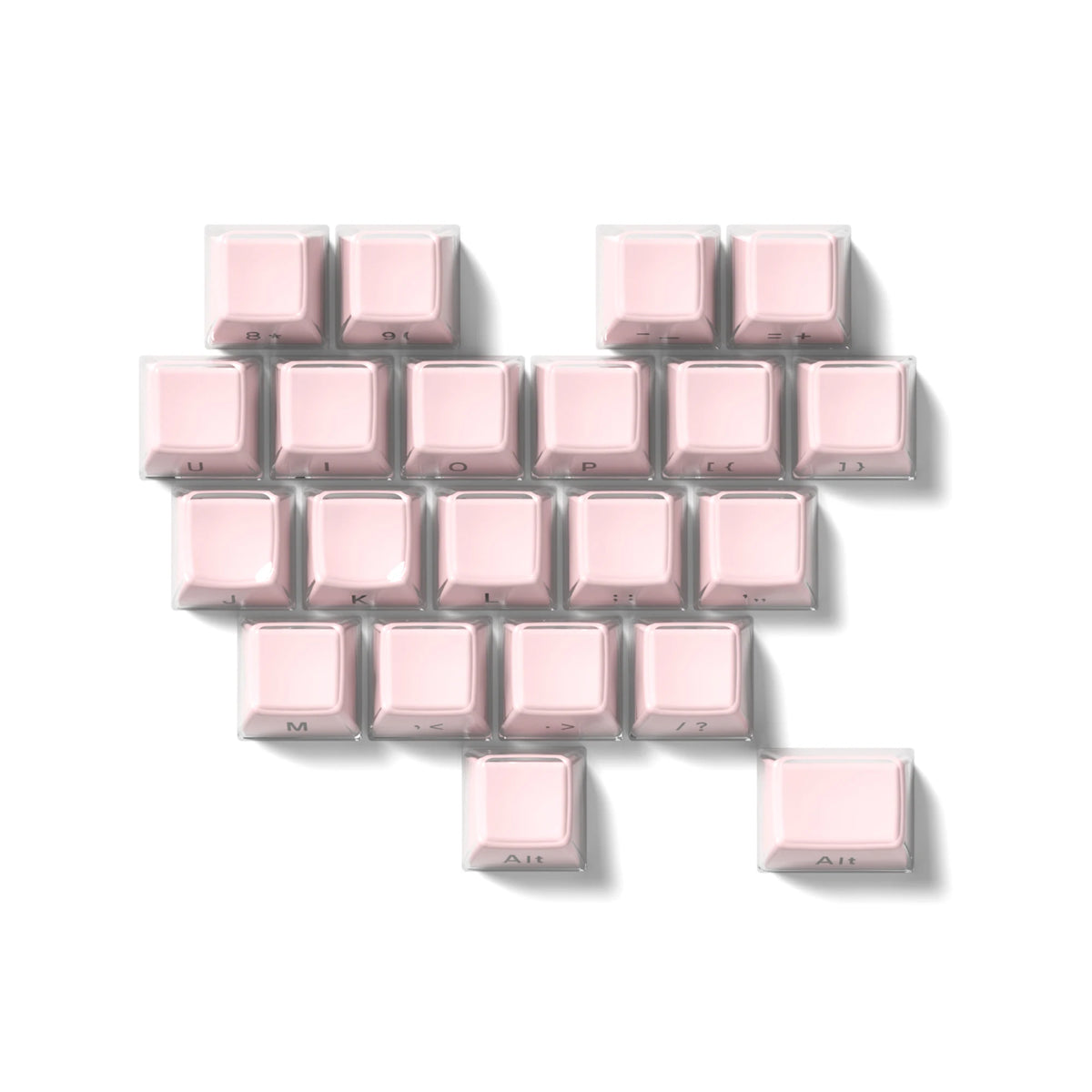 A set of translucent pink ice crystal mechanical keycaps arranged in a letter 'P' shape.