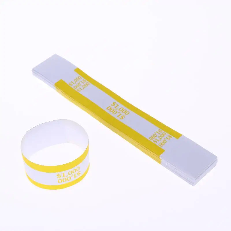 A roll of self-sealing money straps with yellow and white labels for cash organization.