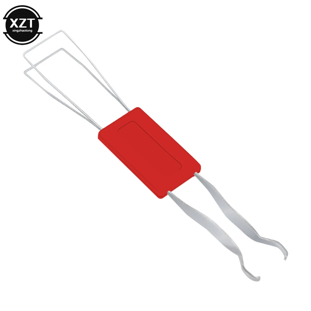 A red 2-in-1 stainless steel keycap and switch puller tool for mechanical keyboards.
