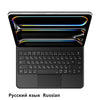 A black magic keyboard cover for an iPad showing colorful light trails on the screen.