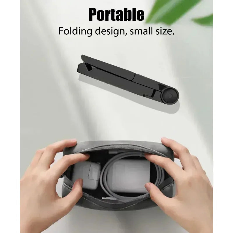 Hands holding a black folding tablet stand with a cable inside.