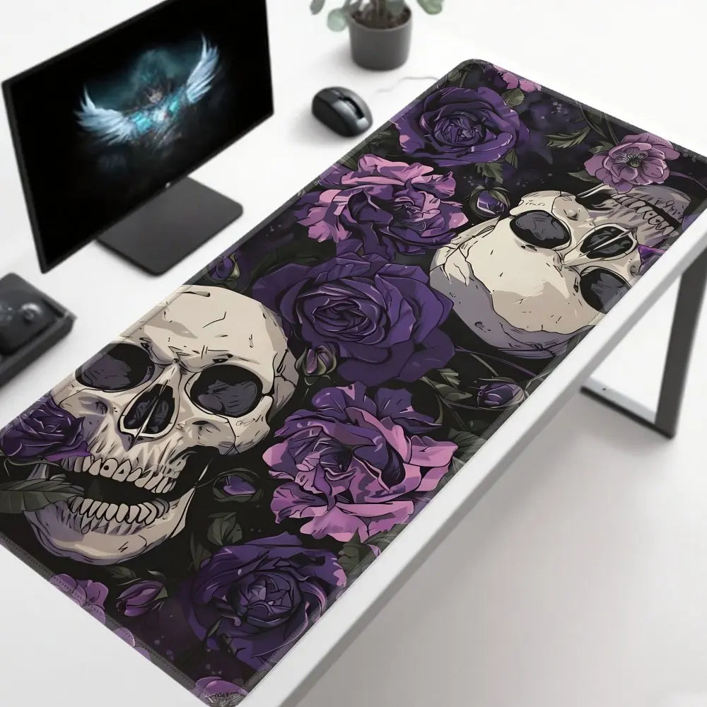 A black desk mat featuring a dark floral design with purple roses and skulls.