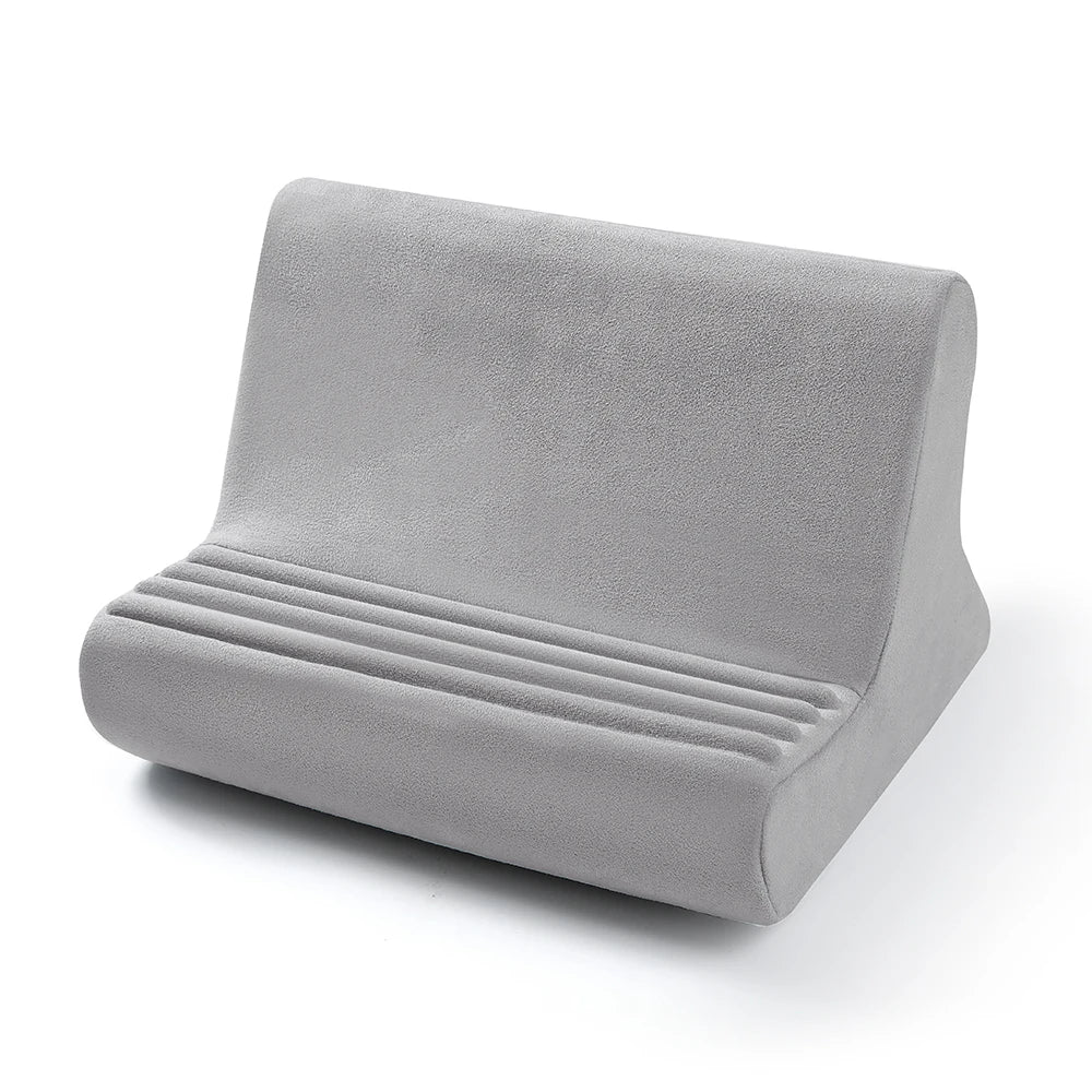A gray multi-angle adjustable tablet and phone holder with ribbed cushioning.