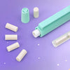 A collection of light mint green mechanical pencil components including a body, refills, and an eraser on a purple surface.