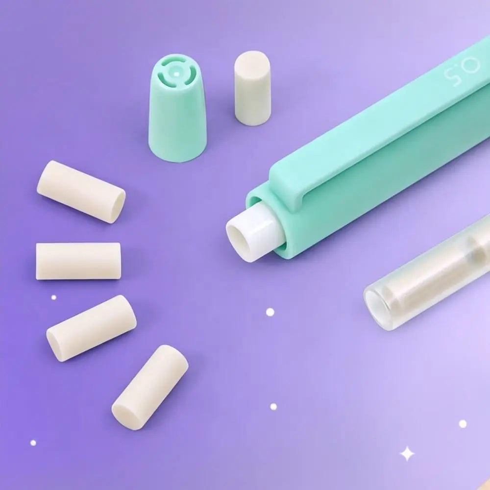 A collection of light mint green mechanical pencil components including a body, refills, and an eraser on a purple surface.