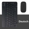 Un clavier et une souris Bluetooth universels noirs avec une souris séparée.