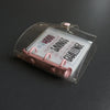 A clear binder for a premium savings challenge with pink accents and a plastic closure.