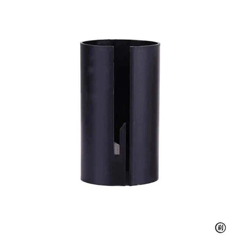 A black portable mini paper cutting machine with a vertical slot design.