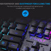 Close-up view of a black mechanical keyboard with blue LED lighting and waterproof/dustproof text overlay.