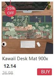 A green patterned desk mat featuring a frog design, displayed on a wooden desk with a computer monitor and keyboard.