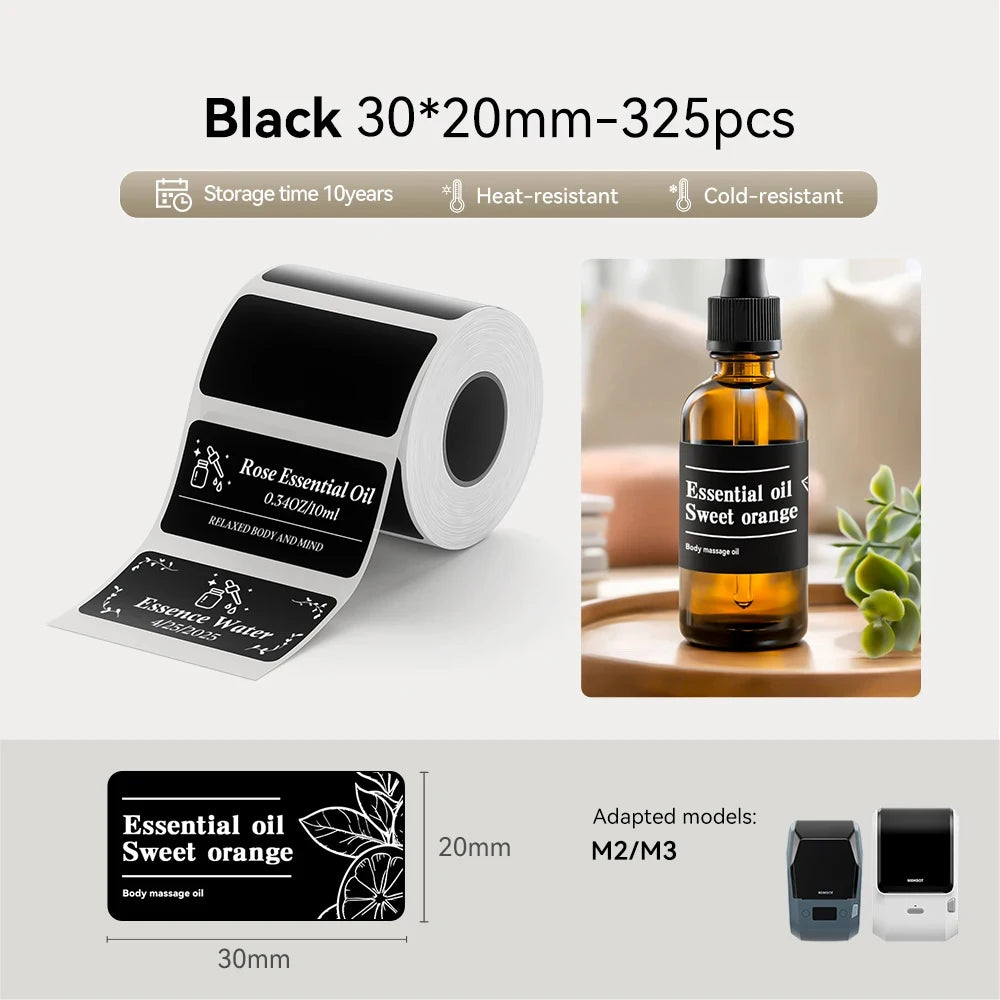 Roll of black thermal transfer stickers with labels for essential oils and massage products