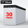 A stack of 30 white self-seal poly mailers with black tops is shown.
