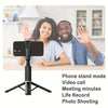 A woman and a man are using a phone stand tripod for video calls or photo shooting.