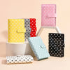 A collection of colorful reusable PU leather binders and wallets displayed on a light background.