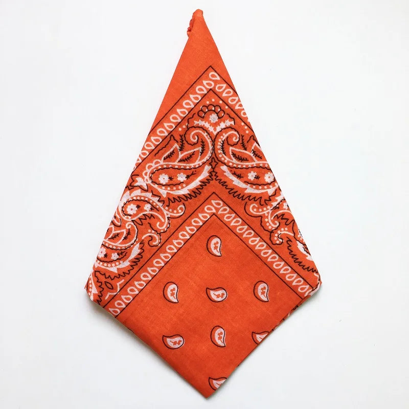 Orange cotton bandana square scarf featuring an intricate white paisley print
