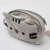 A soft gray plush cat-faced pencil case with a zipper closure.