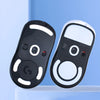 A pair of black and white mouse skates for Logitech G PRO wireless gaming mouse displayed against a light blue background.