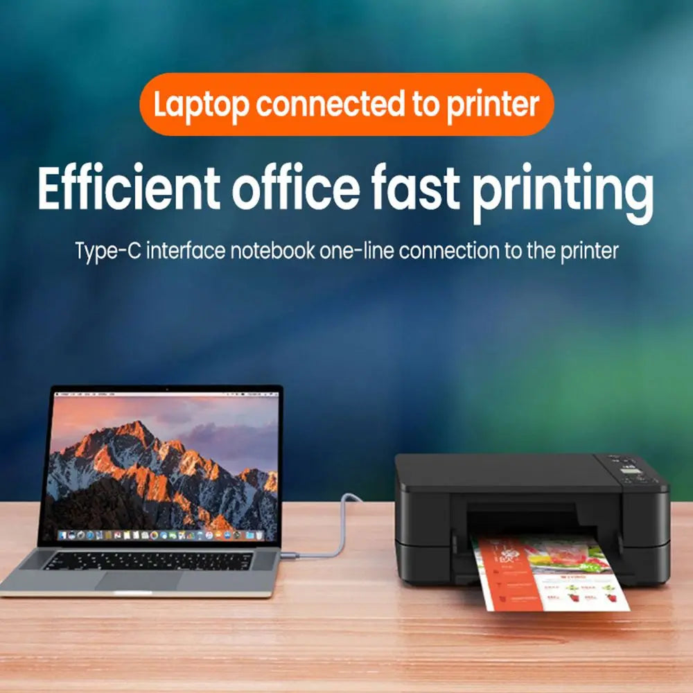 A laptop is connected to a printer using a Type-C interface cable for fast printing.