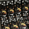 Set thematischer Gelstifte mit Halloween-Designs wie Kürbisse und Fledermäuse in schwarzer Verpackung.