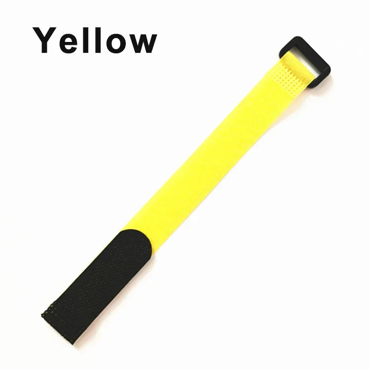 A yellow reusable hook and loop cable tie with a black grip.