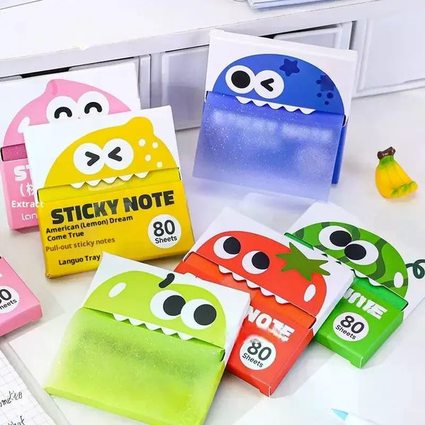 A collection of pearlescent transparent sticky notes in various colors and shapes, including yellow, blue, and green, display