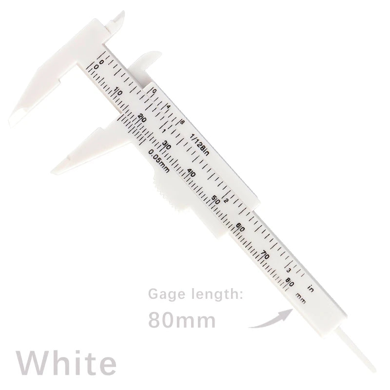 White precision eyebrow measuring caliper with a 80mm gauge length and millimeter markings.