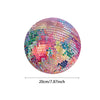 A spherical pink disco ball mouse pad with a non-slip rubber base featuring a mosaic of colorful squares.
