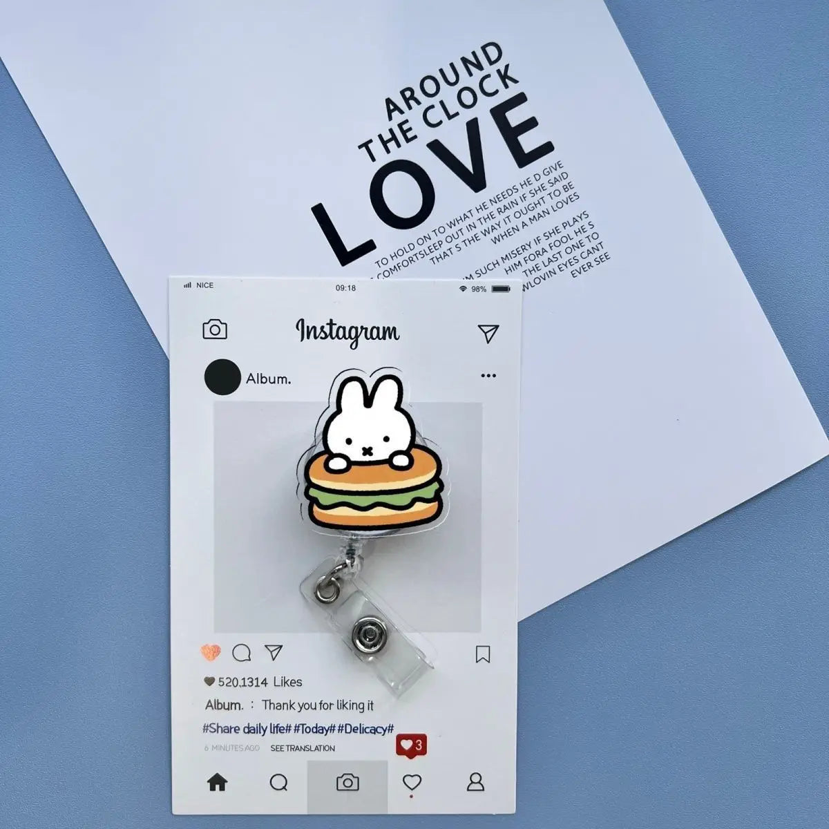 A white Instagram post featuring a Miffy rabbit badge reel attached to an ID card holder against a light background.