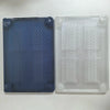 Two translucent hard shell laptop cases, one blue and one clear, showing textured grips.