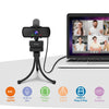 Black HD webcam with built-in microphone and tripod stand connected to a laptop.