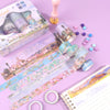 A set of oil painting themed decorative washi tape and a gold-colored paint brush on a purple background.