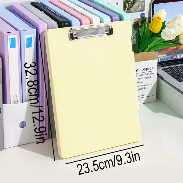 A yellow A4 document and photo storage file box with a silver clasp is shown next to several colored file boxes.