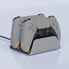 A gray Dual PS5 controller charging station with a fast charging dock resting on a surface.