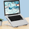 A silver foldable laptop stand is shown supporting a laptop displaying an abstract blue and white marble design.